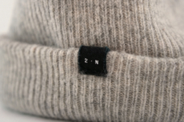 Second Nature grey beanie label