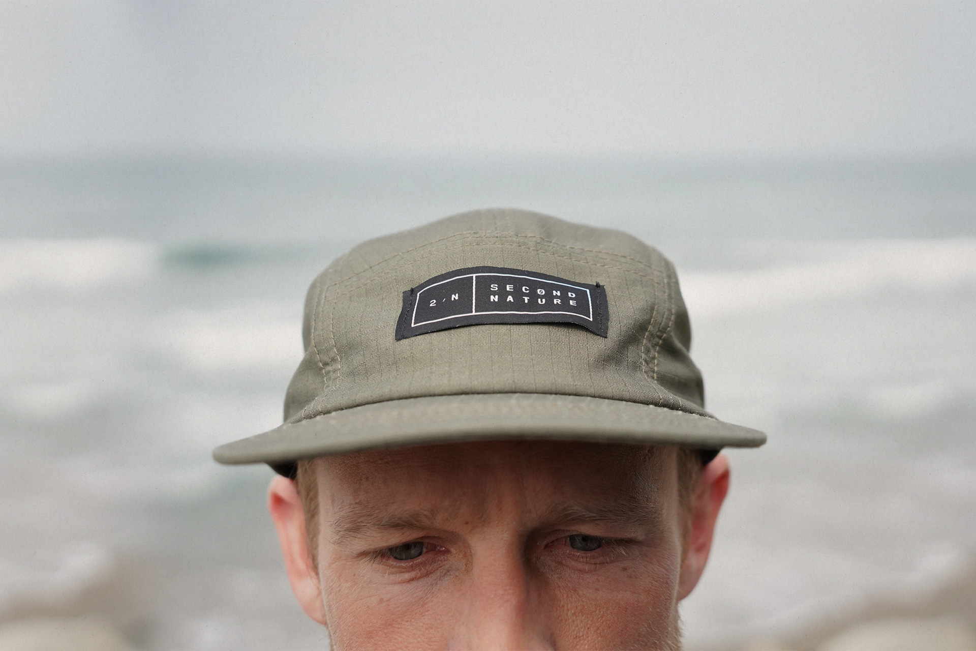 Second Nature 5 panel hat, forrest green with woven labels